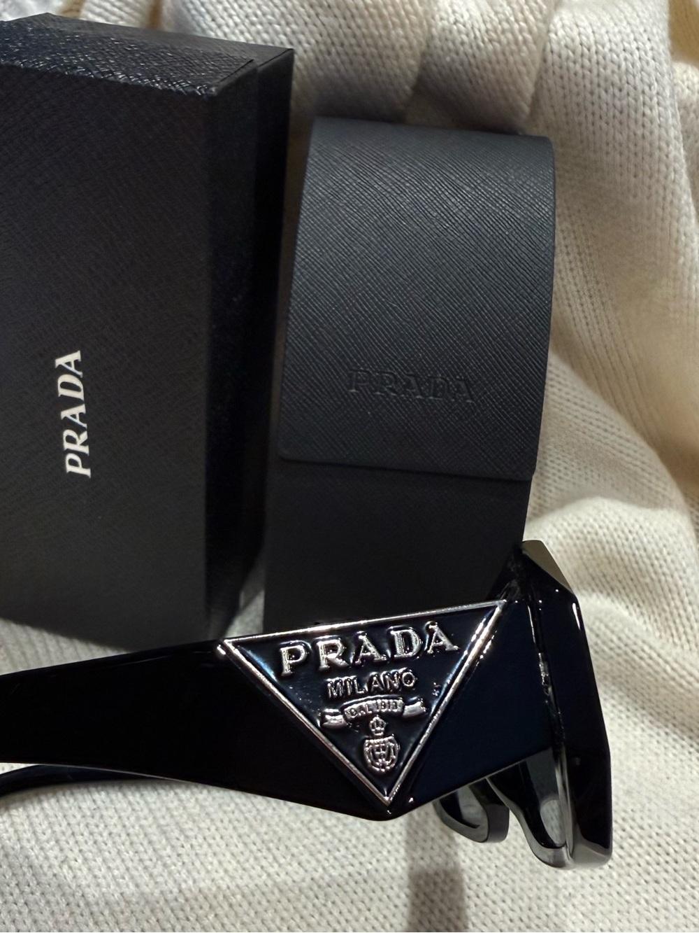 Prada Black Sunglasses with Silver Triangle Emblem